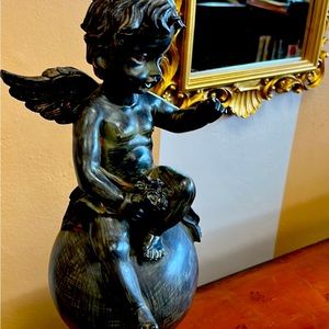 Beautiful 17 inch cherub sitting on sphere sculpture, indoor or outdoor
